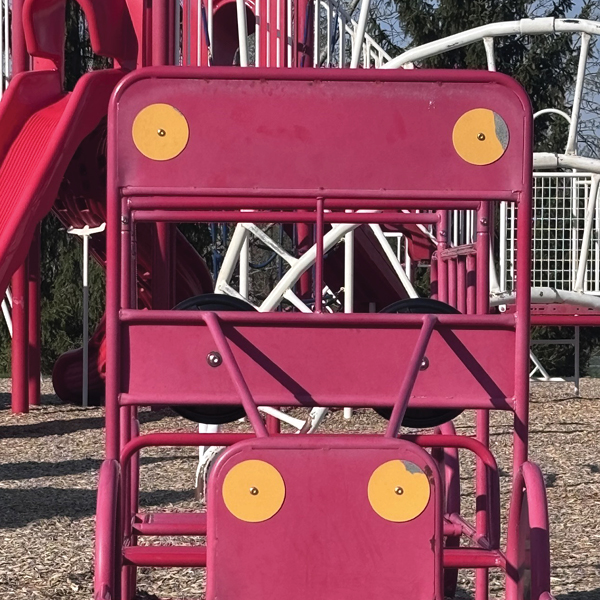 a red climber shaped like the front of a truck